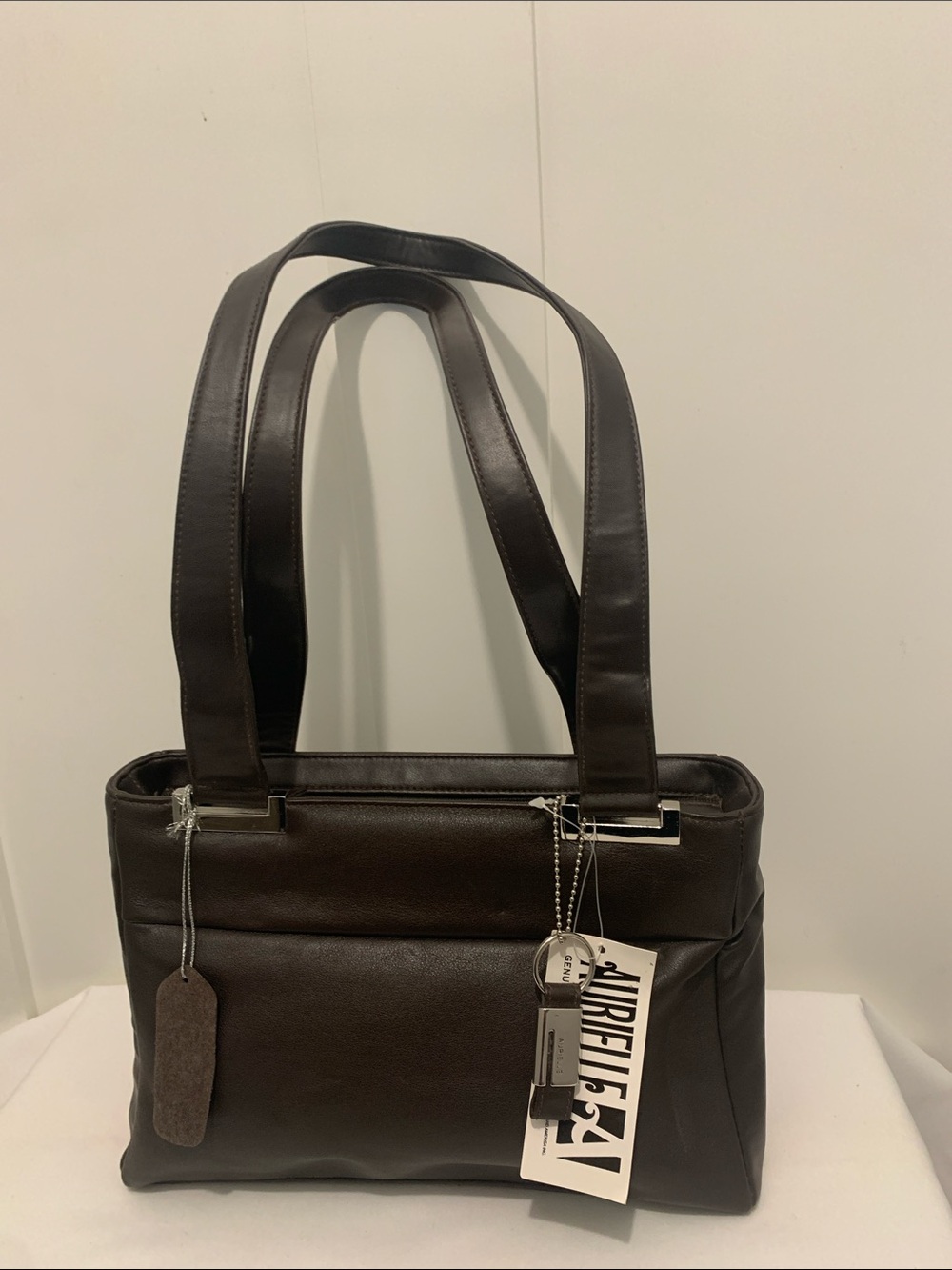 Aurielle Dark Brown Leather Shoulder Bag
The purse is New .